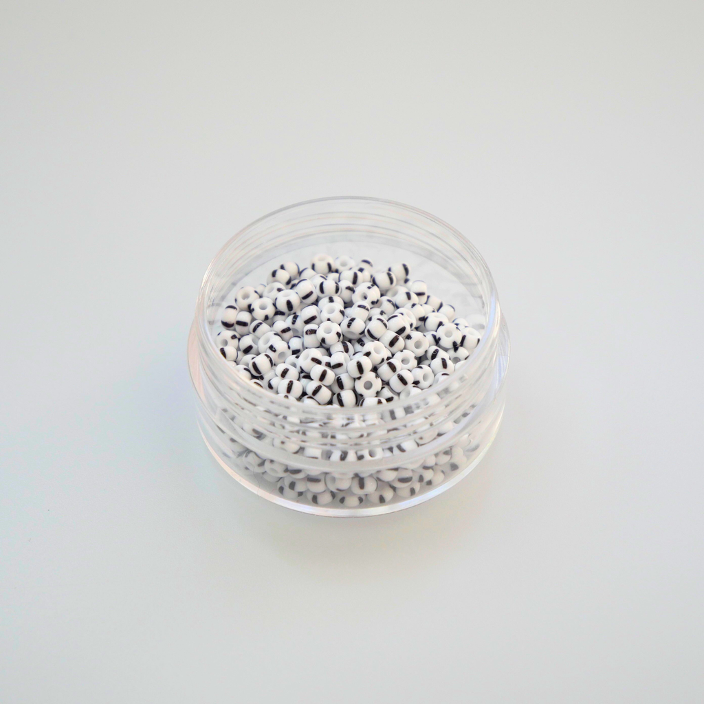 Mustade triipudega valged Preciosa Ornela Rocailles 8/0 seemnehelmed 03590, 10 g