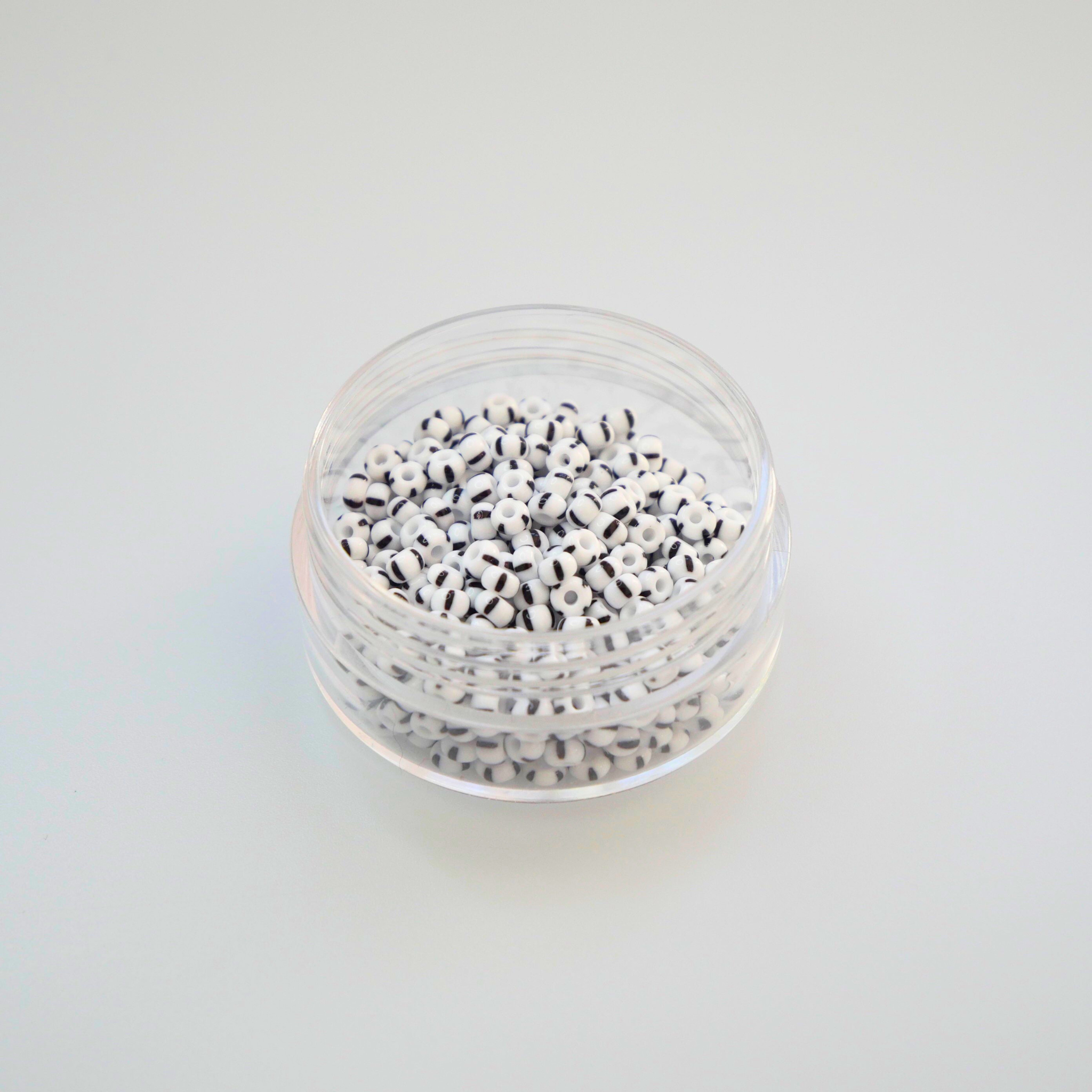 Mustade triipudega valged Preciosa Ornela Rocailles 8/0 seemnehelmed 03590, 10 g