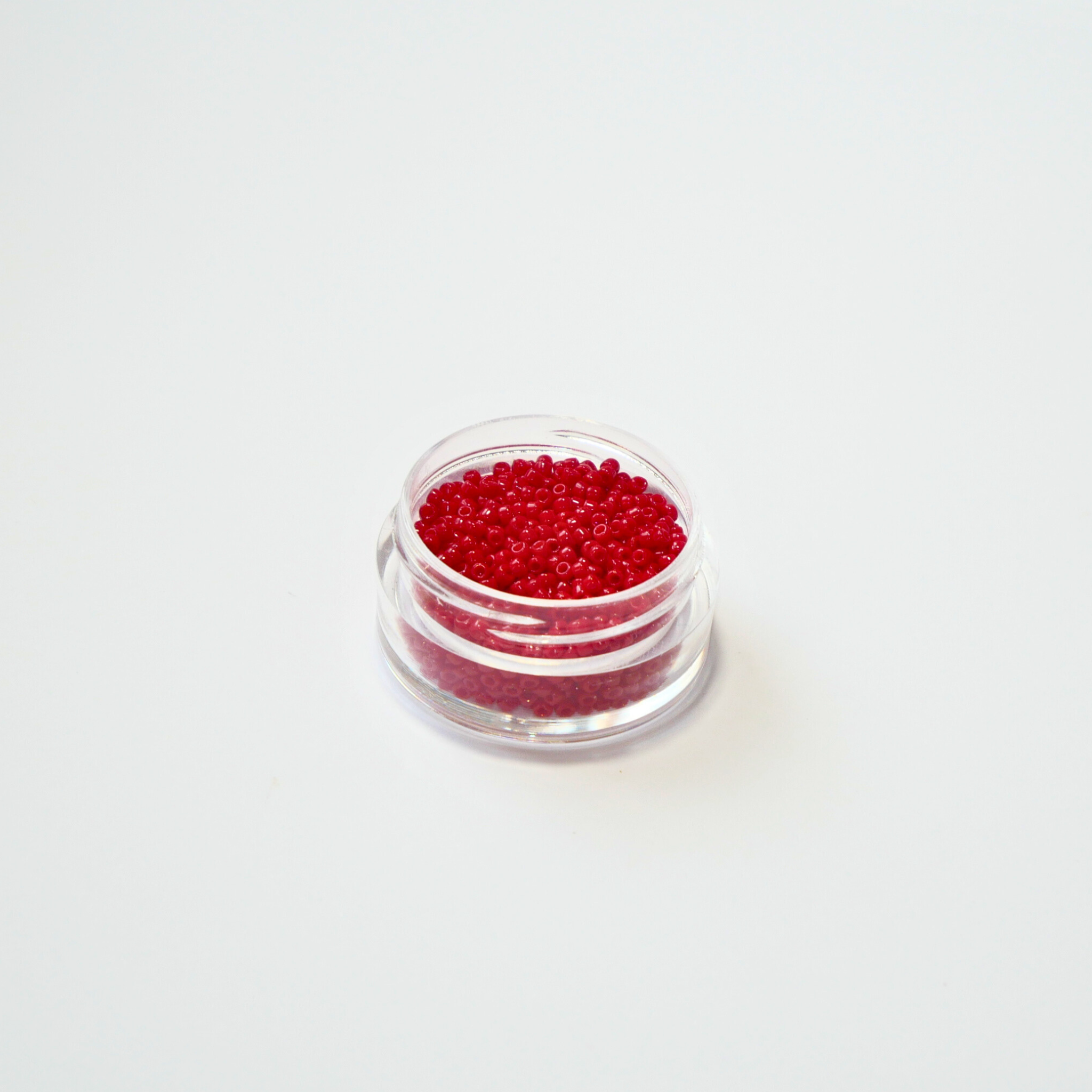 TOHO 15/0 ümmargused mikro-seemnehelmed, läbipaistmatu Pepper Red punane, värvikood 45.