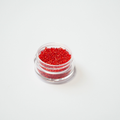 TOHO 15/0 ümmargused mikro-seemnehelmed, hõbedase sisuga sügavpunane (Silver-Lined Siam Ruby), värvikood 25B.